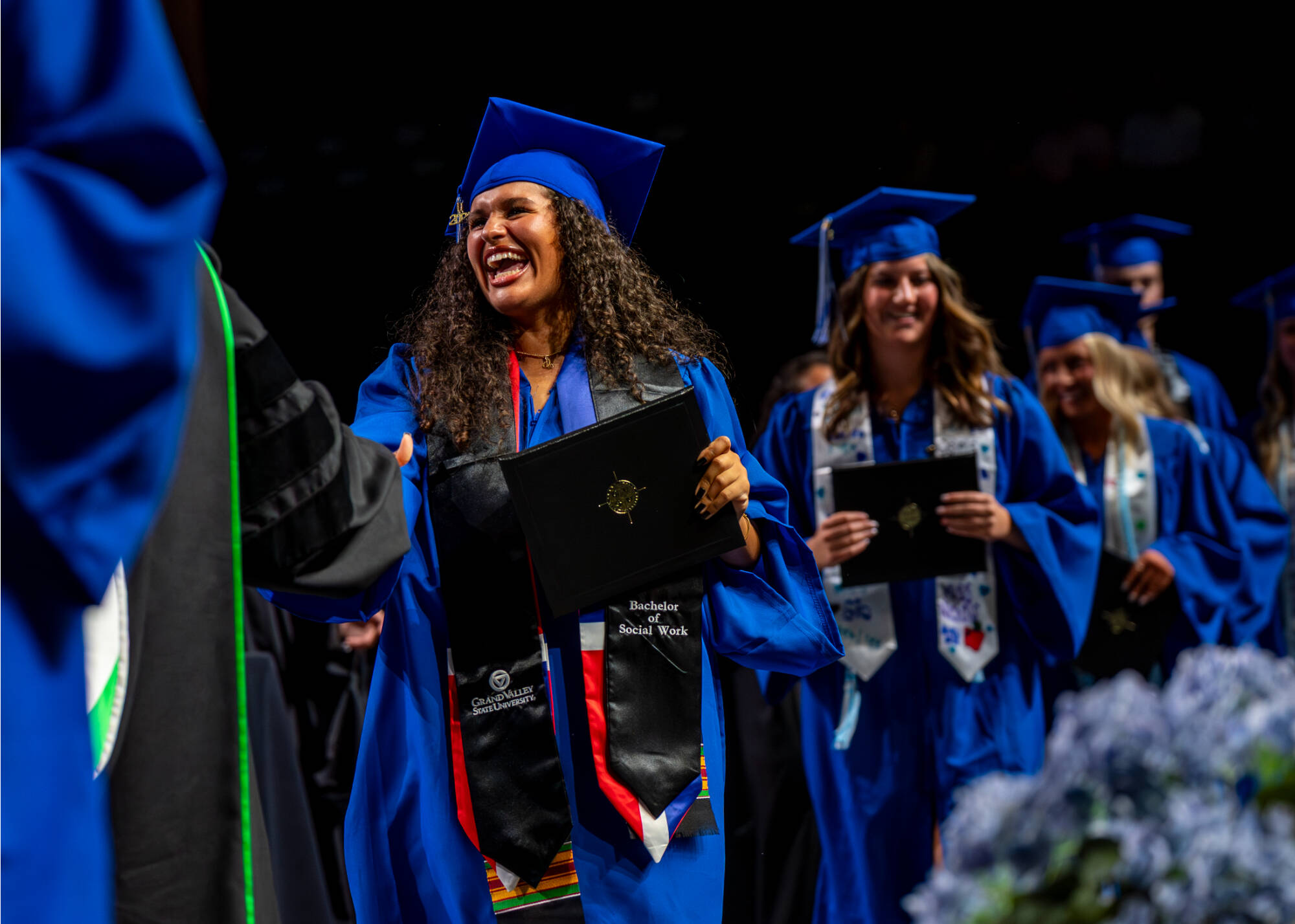 Student excited during commencement.
